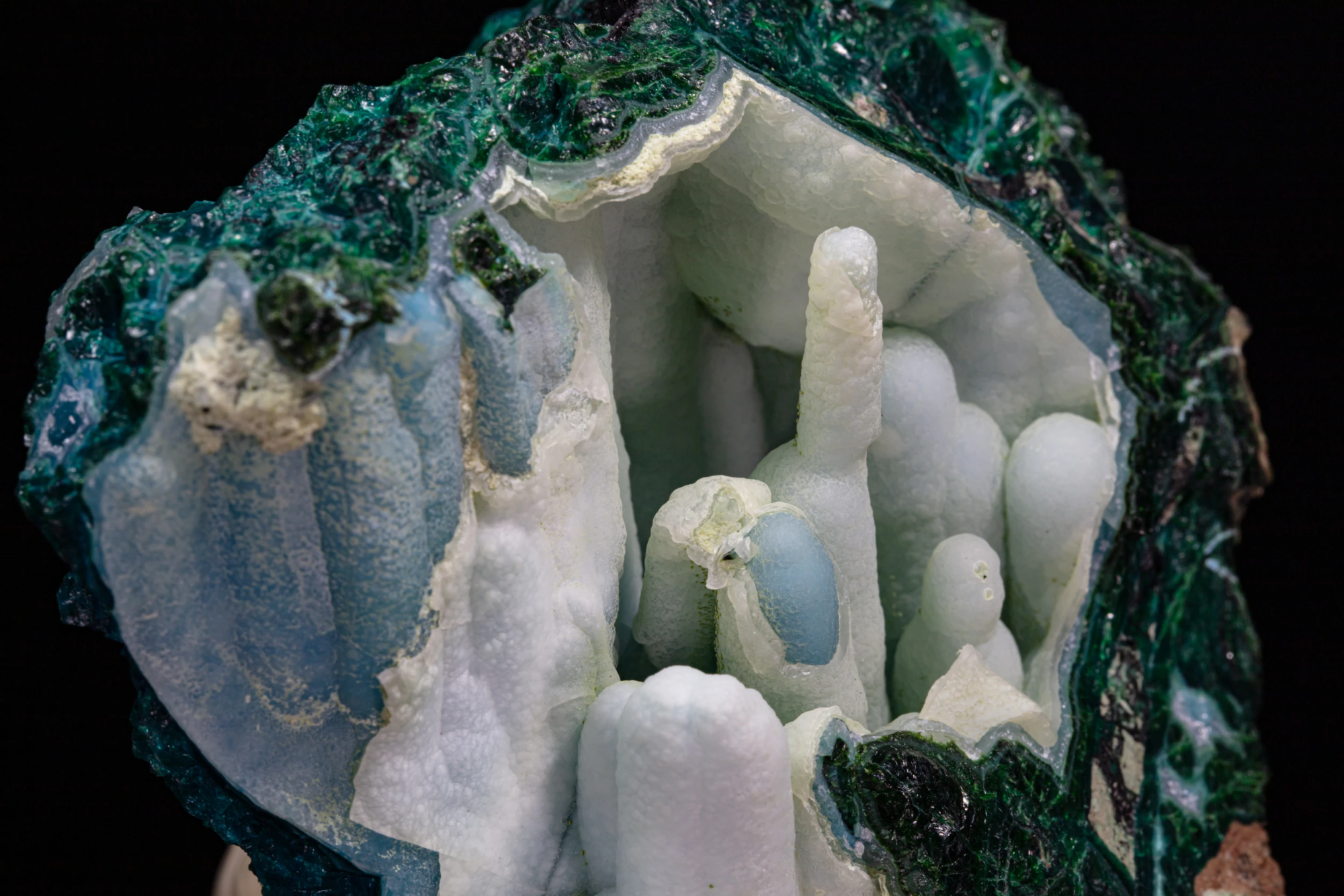 Chrysocolla coated by quartz — interior view showing full white quartz botryoidal cave structure with stalactites blue chrysocolla nodule and deep green exterior