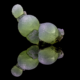 Prehnite botryoidal green globes with dark epidote crystals on black reflective surface, macro photography by Minerals Photography