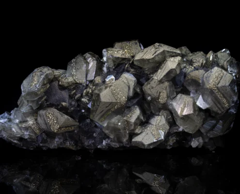 Pyrite and Calcite — Wide Cluster Side View — Minerals Photography Wide pyrite and calcite cluster showing metallic calcite faces with golden pyrite coating and subtle blue-gray tones, macro photography by Minerals Photography