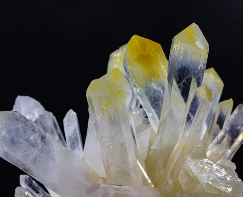 Quartz with Halloysite — Yellow Tips and Blue Reflections — Minerals Photography Quartz crystals with yellow halloysite tips and blue internal reflections showing color zoning gradient, macro photography by Minerals Photography