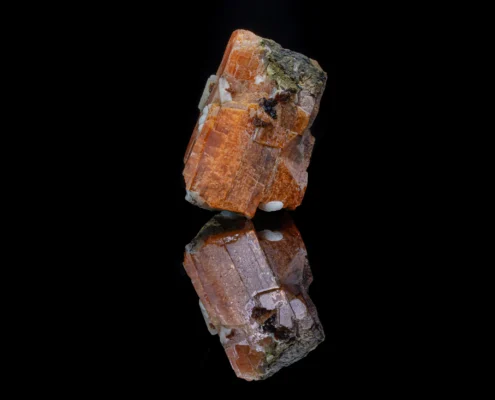 Serandite — Full Specimen with Reflection — Minerals Photography Macro detail showing rhodochrosite crystals ranging from deep red to pale pink-salmon alongside white calcite blades, with dark gray matrix and yellow secondary mineral inclusions.