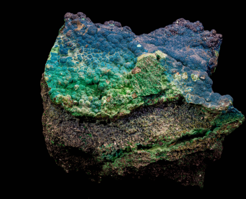 Green botryoidal cornetite mineral clusters on dark matrix, Congo.